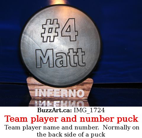Player number 4 Matt engraved hockey puck